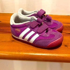 6 toddler adidas.  Velcro. Barely worn on soles.